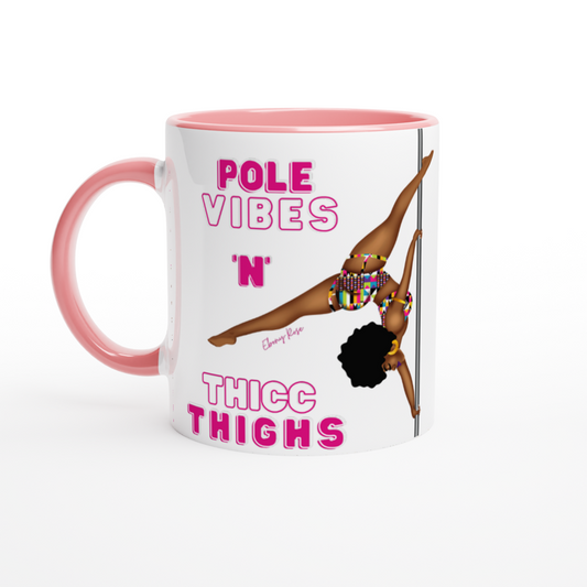 White mug with pink coloured rim, inside, and handle. featuring a black pole dancer wearing bright African inspired Afrocentric garter pole shorts and sports top. Bright pink knee socks and clear platform heels in an extended butterfly pole pose with slogan affirmation pole vibes n thicc vibes
